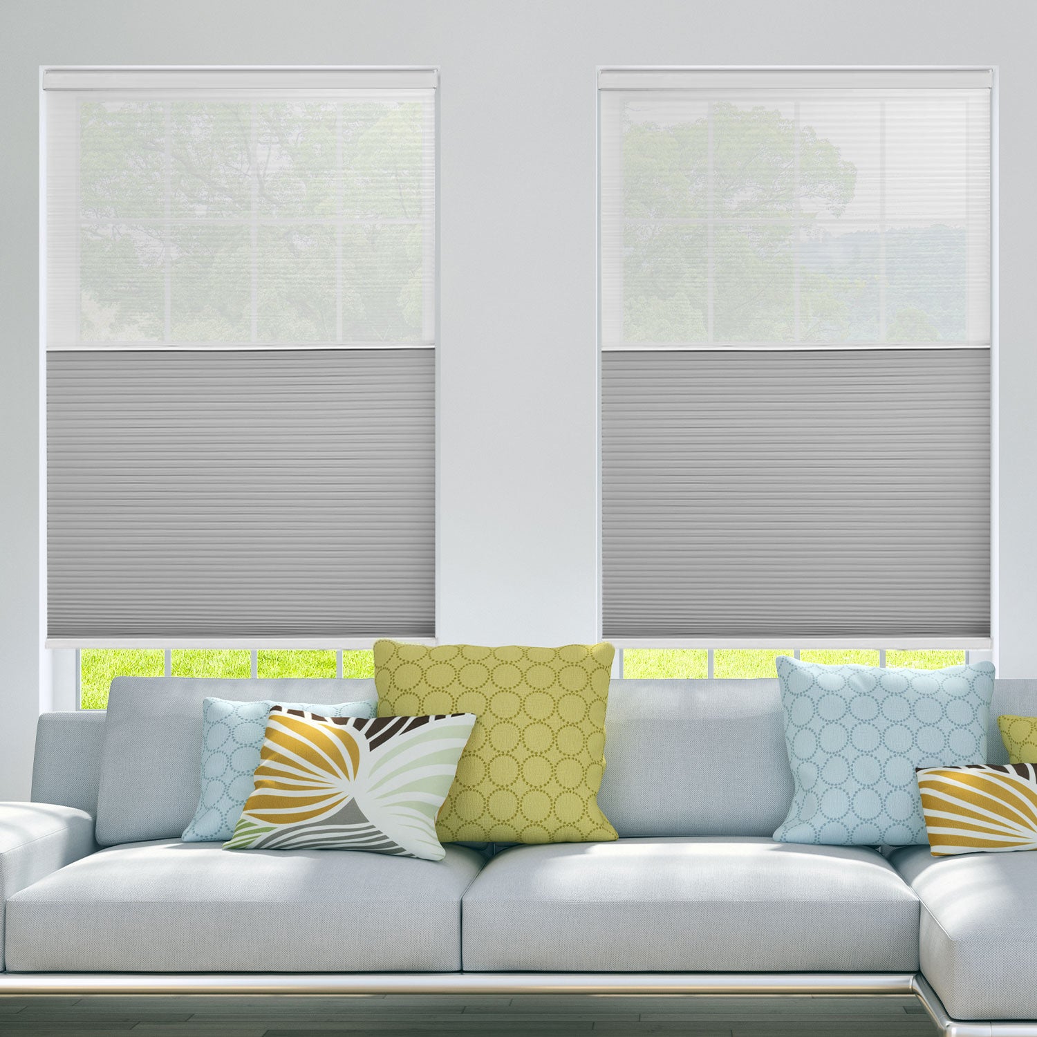 BlindsMagic motorized cellular shades installed in a bright living room with modern decor.
